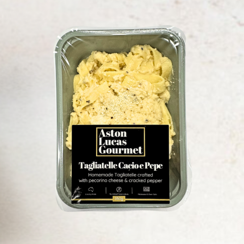 Tagliatelle Cacio E Pepe packaged in a container with a black Aston Lucas Gourmet label.