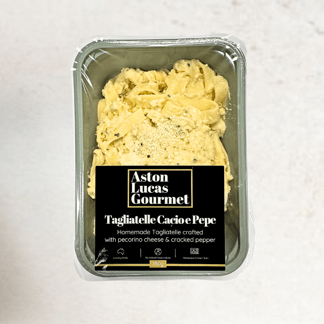 Tagliatelle Cacio E Pepe packaged in a container with a black Aston Lucas Gourmet label.